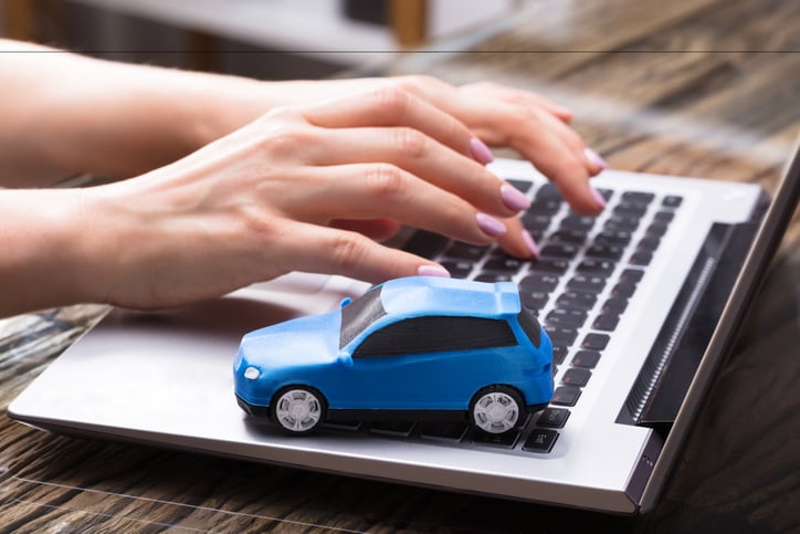 Laptop and Model Automobile