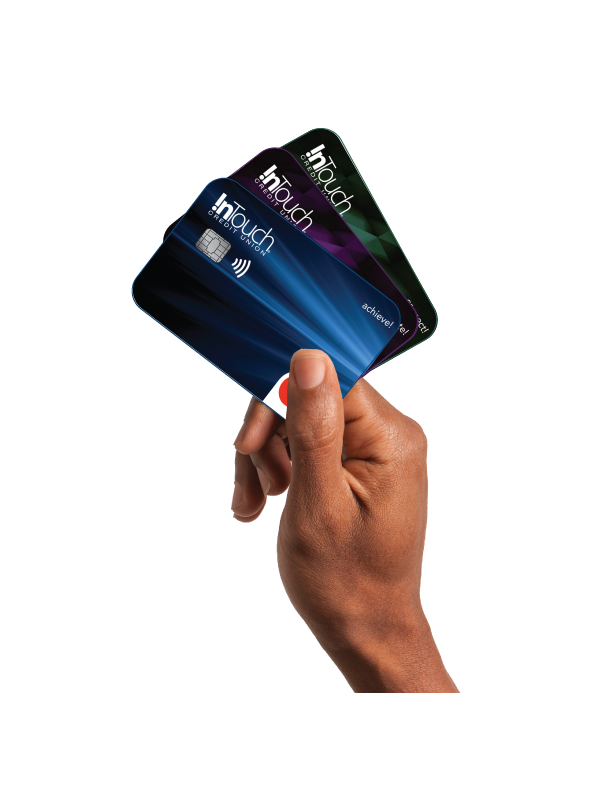 Hand Holding Three Different ITCU Credit Cards